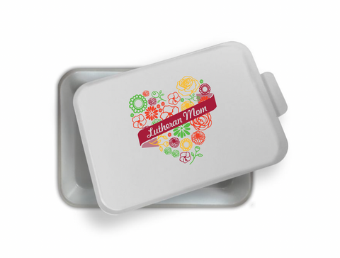 Lutheran Mom Baking Pan. Colorful Heart made in Flowers with ribbon over top that says "Lutheran Mom"
